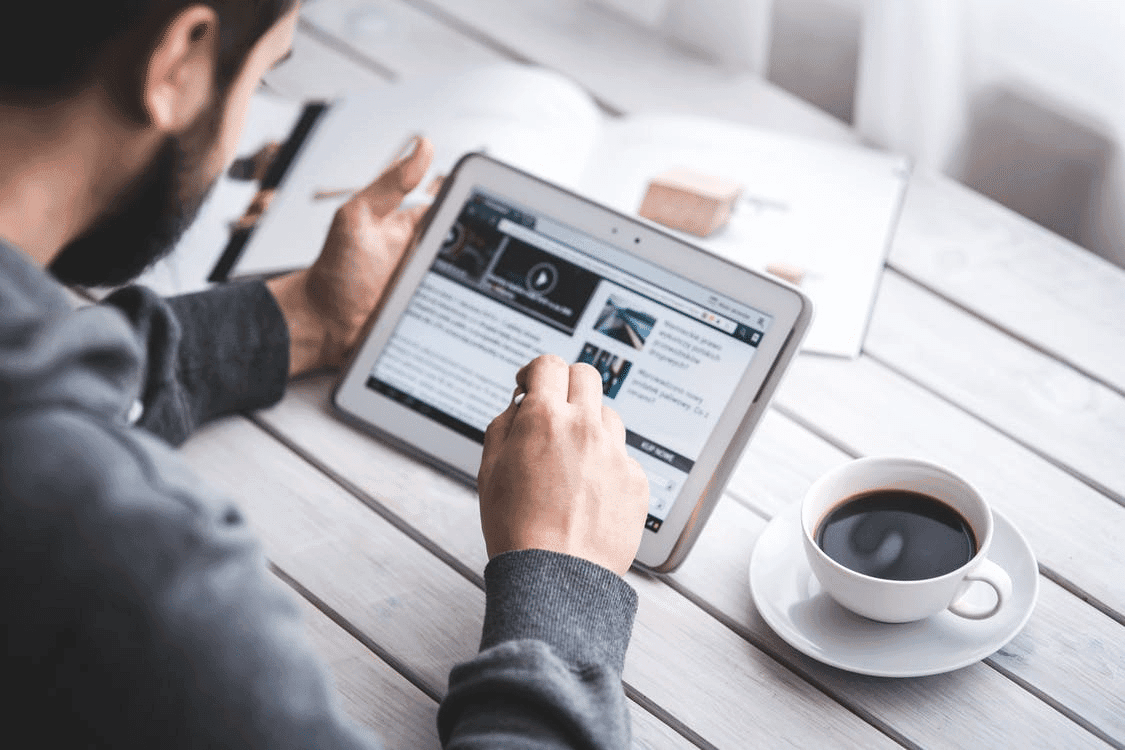A man looking at online courses